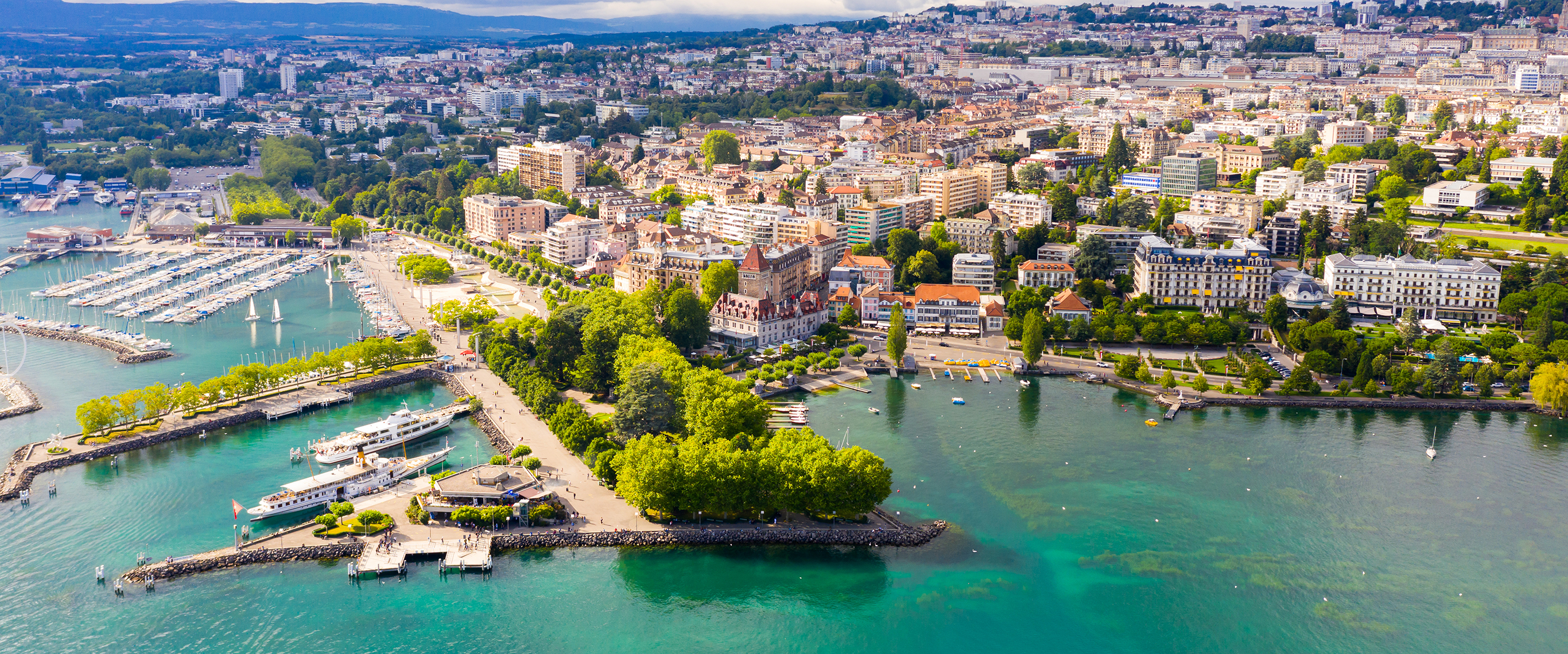 Picturesque aerial view from lake Geneva of Swiss town of Lausanne